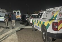 Police vehicles outside a house in Mamelodi East during the hostage standoff.
