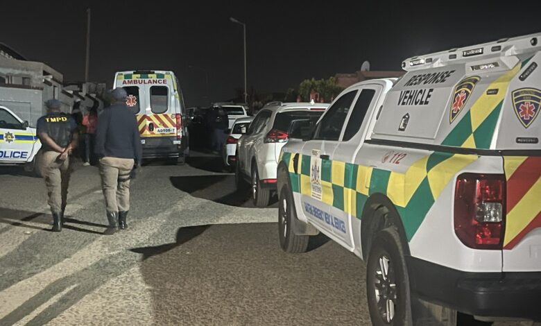 Police vehicles outside a house in Mamelodi East during the hostage standoff.